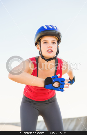 To use this stock image in your creative project, please select the size you need over to the right and click the "Add to Cart" button.
Your downloaded image will come with the Cutcaster watermark removed so don’t worry about the watermark you see on this page. Focused sporty blonde skating stock photo, Focused sporty blonde skating at promenade by Wavebreak Media