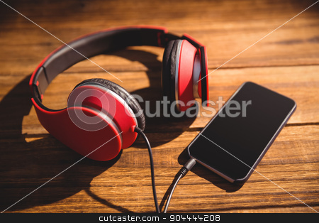 To use this stock image in your creative project, please select the size you need over to the right and click the "Add to Cart" button.
Your downloaded image will come with the Cutcaster watermark removed so don’t worry about the watermark you see on this page. View of a desk stock photo, View of a desk with headphones by Wavebreak Media