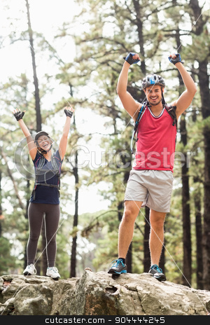 To use this stock image in your creative project, please select the size you need over to the right and click the "Add to Cart" button.
Your downloaded image will come with the Cutcaster watermark removed so don’t worry about the watermark you see on this page. Young happy biker couple standing on a rock looking at the camer stock photo, Young happy biker couple standing on a rock looking at the camera in the nature by Wavebreak Media
