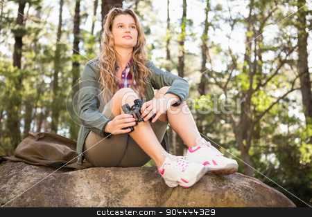 To use this stock image in your creative project, please select the size you need over to the right and click the "Add to Cart" button.
Your downloaded image will come with the Cutcaster watermark removed so don’t worry about the watermark you see on this page. Pretty blonde hiker with binoculars sitting on stone stock photo, Pretty blonde hiker with binoculars sitting on stone in the nature by Wavebreak Media