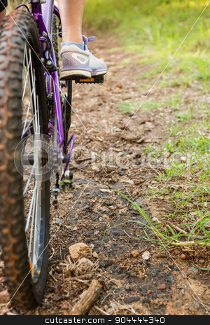 To use this stock image in your creative project, please select the size you need over to the right and click the "Add to Cart" button.
Your downloaded image will come with the Cutcaster watermark removed so don’t worry about the watermark you see on this page. Close up view of woman pedaling on mountain bike stock photo, Close up view of woman pedaling on mountain bike in the nature by Wavebreak Media
