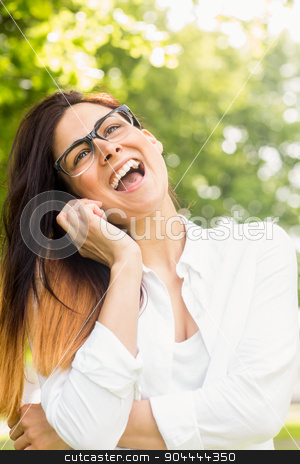 To use this stock image in your creative project, please select the size you need over to the right and click the "Add to Cart" button.
Your downloaded image will come with the Cutcaster watermark removed so don’t worry about the watermark you see on this page. Beautiful brunette making a call in the park stock photo, Beautiful brunette making a call in the park on a sunny day by Wavebreak Media