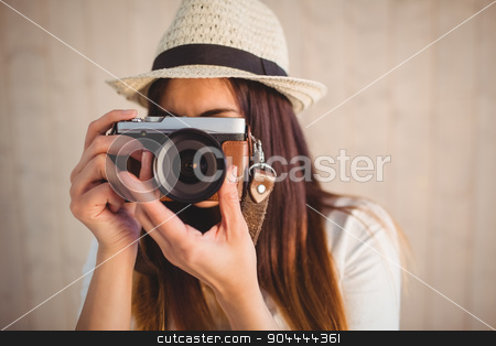To use this stock image in your creative project, please select the size you need over to the right and click the "Add to Cart" button.
Your downloaded image will come with the Cutcaster watermark removed so don’t worry about the watermark you see on this page. Pretty hipster using her vintage camera stock photo, Pretty hipster using her vintage camera on wooden planks background by Wavebreak Media