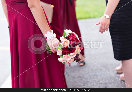To use this stock image in your creative project, please select the size you need over to the right and click the "Add to Cart" button.
Your downloaded image will come with the Cutcaster watermark removed so don’t worry about the watermark you see on this page. Wedding bouquet of a bride and bridesmaid stock photo, Red wedding bouquet of a bride and bridesmaid by Satura86