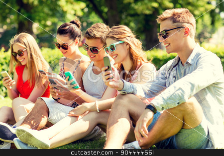 To use this stock image in your creative project, please select the size you need over to the right and click the "Add to Cart" button.
Your downloaded image will come with the Cutcaster watermark removed so don’t worry about the watermark you see on this page. smiling friends with smartphones sitting on grass stock photo, friendship, leisure, summer, technology and people concept - group of smiling friends with smartphones sitting on grass in park by Syda Productions