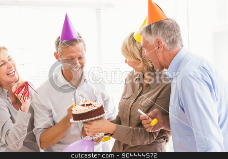 To use this stock image in your creative project, please select the size you need over to the right and click the "Add to Cart" button.
Your downloaded image will come with the Cutcaster watermark removed so don’t worry about the watermark you see on this page. Laughing casual business people celebrating birthday stock photo, Laughing casual business people celebrating birthday in the office by Wavebreak Media