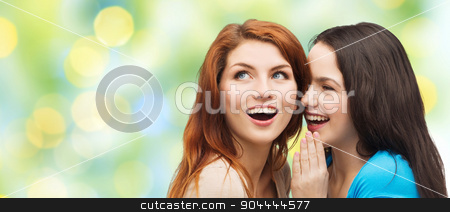 To use this stock image in your creative project, please select the size you need over to the right and click the "Add to Cart" button.
Your downloaded image will come with the Cutcaster watermark removed so don’t worry about the watermark you see on this page. teenage girls or women whispering gossip stock photo, friendship, secrecy and people concept - two smiling girls or young women whispering gossip over green lights background by Syda Productions