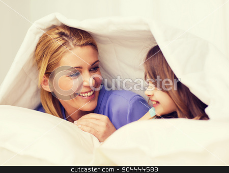 To use this stock image in your creative project, please select the size you need over to the right and click the "Add to Cart" button.
Your downloaded image will come with the Cutcaster watermark removed so don’t worry about the watermark you see on this page. mother and little girl under blanket at home stock photo, family, child and home concept - smiling mother and little girl under blanket at home by Syda Productions