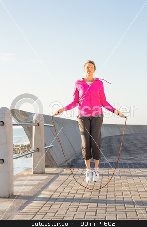 To use this stock image in your creative project, please select the size you need over to the right and click the "Add to Cart" button.
Your downloaded image will come with the Cutcaster watermark removed so don’t worry about the watermark you see on this page. Sporty woman skipping at promenade stock photo, Sporty woman skipping at promenade on a sunny day by Wavebreak Media