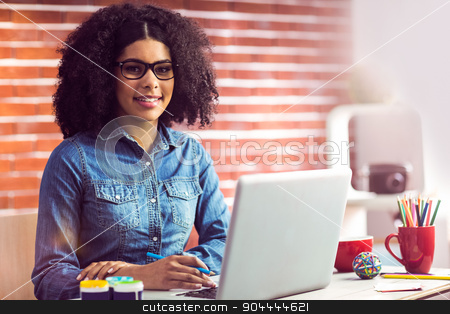 To use this stock image in your creative project, please select the size you need over to the right and click the "Add to Cart" button.
Your downloaded image will come with the Cutcaster watermark removed so don’t worry about the watermark you see on this page. Portrait of a casual businesswoman at her desk stock photo, Portrait of a casual businesswoman at her desk in her office by Wavebreak Media
