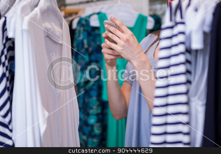 To use this stock image in your creative project, please select the size you need over to the right and click the "Add to Cart" button.
Your downloaded image will come with the Cutcaster watermark removed so don’t worry about the watermark you see on this page. Woman taking a photo of dress stock photo, Woman taking a photo of dress in fashion boutique by Wavebreak Media