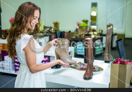 To use this stock image in your creative project, please select the size you need over to the right and click the "Add to Cart" button.
Your downloaded image will come with the Cutcaster watermark removed so don’t worry about the watermark you see on this page. Pretty woman shopping for shoes stock photo, Pretty woman shopping for shoes at the shopping mall by Wavebreak Media