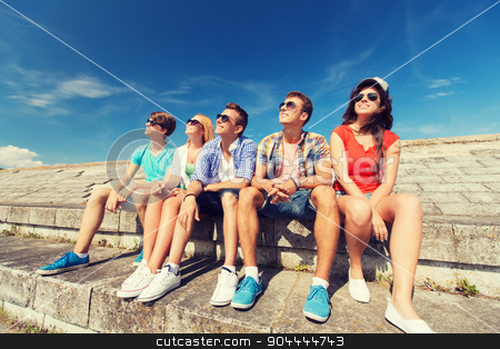 To use this stock image in your creative project, please select the size you need over to the right and click the "Add to Cart" button.
Your downloaded image will come with the Cutcaster watermark removed so don’t worry about the watermark you see on this page. group of smiling friends sitting on city street stock photo, friendship, leisure, summer and people concept - group of smiling friends sitting on city street by Syda Productions