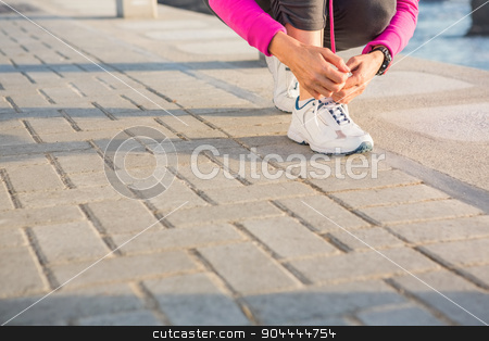 To use this stock image in your creative project, please select the size you need over to the right and click the "Add to Cart" button.
Your downloaded image will come with the Cutcaster watermark removed so don’t worry about the watermark you see on this page. Sporty woman tying her shoelace at promenade stock photo, Sporty woman tying her shoelace at promenade on a sunny day by Wavebreak Media
