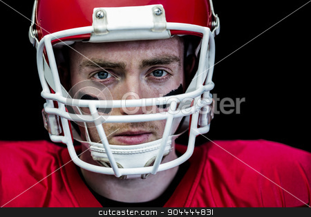 To use this stock image in your creative project, please select the size you need over to the right and click the "Add to Cart" button.
Your downloaded image will come with the Cutcaster watermark removed so don’t worry about the watermark you see on this page. Portrait of focused american football player wearing his helmet stock photo, Portrait of focused american football player wearing his helmet against black background by Wavebreak Media