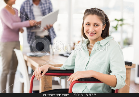 To use this stock image in your creative project, please select the size you need over to the right and click the "Add to Cart" button.
Your downloaded image will come with the Cutcaster watermark removed so don’t worry about the watermark you see on this page. Smiling casual businesswoman in wheelchair stock photo, Portrait of smiling casual businesswoman in wheelchair in the office by Wavebreak Media