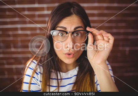 To use this stock image in your creative project, please select the size you need over to the right and click the "Add to Cart" button.
Your downloaded image will come with the Cutcaster watermark removed so don’t worry about the watermark you see on this page. Pretty hipster posing for camera stock photo, Pretty hipster posing for camera on red brick background by Wavebreak Media