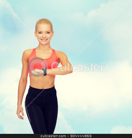 To use this stock image in your creative project, please select the size you need over to the right and click the "Add to Cart" button.
Your downloaded image will come with the Cutcaster watermark removed so don’t worry about the watermark you see on this page. smiling woman with heart rate monitor on hand stock photo, fitness, technology and exercising concept - smiling woman with heart rate monitor on hand by Syda Productions