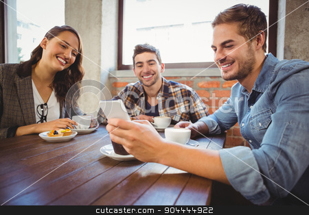 To use this stock image in your creative project, please select the size you need over to the right and click the "Add to Cart" button.
Your downloaded image will come with the Cutcaster watermark removed so don’t worry about the watermark you see on this page. Smiling friends looking at smartphone stock photo, Smiling friends looking at smartphone at coffee shop by Wavebreak Media