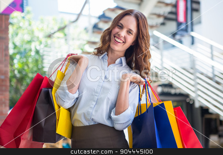 To use this stock image in your creative project, please select the size you need over to the right and click the "Add to Cart" button.
Your downloaded image will come with the Cutcaster watermark removed so don’t worry about the watermark you see on this page. Pretty woman shopping at the mall stock photo, Pretty woman shopping at the mall on a sunny day by Wavebreak Media