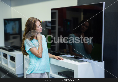 To use this stock image in your creative project, please select the size you need over to the right and click the "Add to Cart" button.
Your downloaded image will come with the Cutcaster watermark removed so don’t worry about the watermark you see on this page. Pretty woman shopping for new television stock photo, Pretty woman shopping for new television at the electronics store by Wavebreak Media