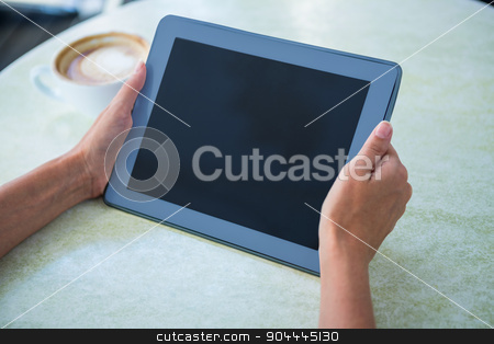 To use this stock image in your creative project, please select the size you need over to the right and click the "Add to Cart" button.
Your downloaded image will come with the Cutcaster watermark removed so don’t worry about the watermark you see on this page. Woman using tablet on cafe terrace stock photo, Woman using tablet on cafe terrace on a sunny day by Wavebreak Media