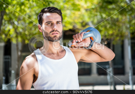To use this stock image in your creative project, please select the size you need over to the right and click the "Add to Cart" button.
Your downloaded image will come with the Cutcaster watermark removed so don’t worry about the watermark you see on this page. Handsome athlete outfit with a kettlebell stock photo, Handsome athlete outfit with a kettlebell on a sunny day by Wavebreak Media