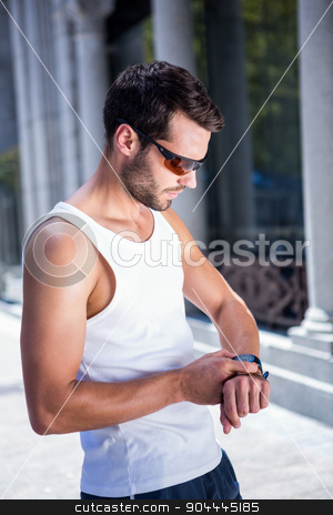 To use this stock image in your creative project, please select the size you need over to the right and click the "Add to Cart" button.
Your downloaded image will come with the Cutcaster watermark removed so don’t worry about the watermark you see on this page. Handsome athlete with sunglasses setting heart rate watch stock photo, Handsome athlete with sunglasses setting heart rate watch in the city by Wavebreak Media