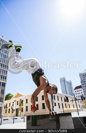 To use this stock image in your creative project, please select the size you need over to the right and click the "Add to Cart" button.
Your downloaded image will come with the Cutcaster watermark removed so don’t worry about the watermark you see on this page. Handsome athlete doing a headstand stock photo, Handsome athlete doing a headstand on a sunny day by Wavebreak Media