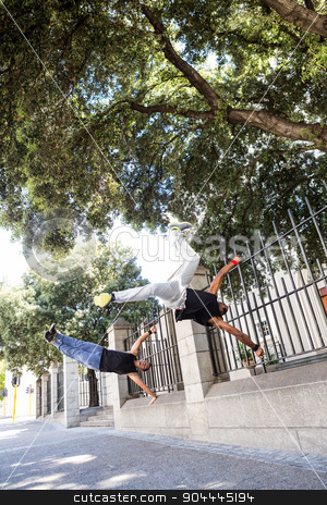 To use this stock image in your creative project, please select the size you need over to the right and click the "Add to Cart" button.
Your downloaded image will come with the Cutcaster watermark removed so don’t worry about the watermark you see on this page. Happy friends doing parkour in the city stock photo, Happy friends doing parkour in the city on a sunny day by Wavebreak Media