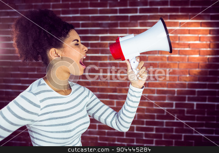 To use this stock image in your creative project, please select the size you need over to the right and click the "Add to Cart" button.
Your downloaded image will come with the Cutcaster watermark removed so don’t worry about the watermark you see on this page. Young woman using her megaphone in the light stock photo, Young woman using her megaphone in the light against a red brick wall by Wavebreak Media