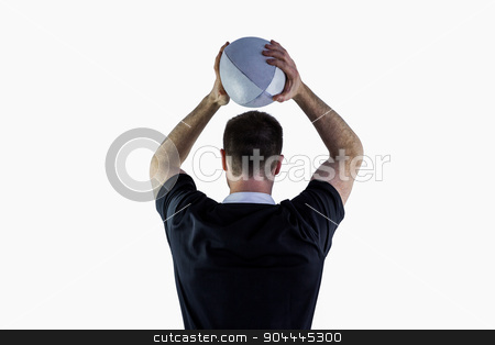 To use this stock image in your creative project, please select the size you need over to the right and click the "Add to Cart" button.
Your downloaded image will come with the Cutcaster watermark removed so don’t worry about the watermark you see on this page. Rugby player about to throw a rugby ball stock photo, Back view of a rugby player about to throw a rugby ball by Wavebreak Media