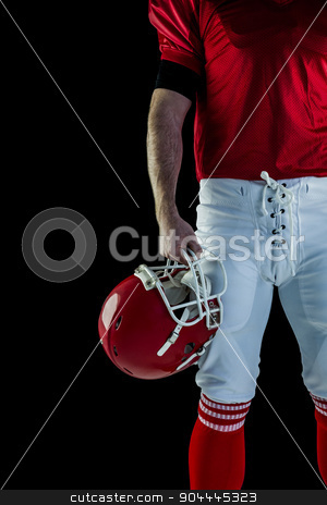 To use this stock image in your creative project, please select the size you need over to the right and click the "Add to Cart" button.
Your downloaded image will come with the Cutcaster watermark removed so don’t worry about the watermark you see on this page. American football player holding his helmet stock photo, American football player holding his helmet against black background by Wavebreak Media