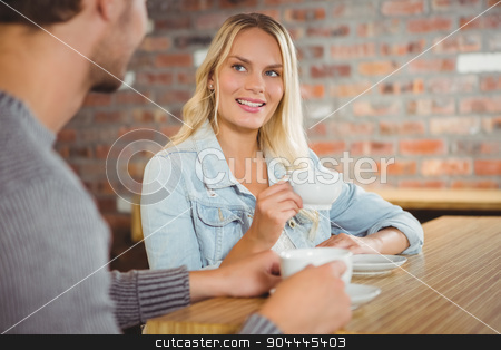 To use this stock image in your creative project, please select the size you need over to the right and click the "Add to Cart" button.
Your downloaded image will come with the Cutcaster watermark removed so don’t worry about the watermark you see on this page. Smiling blonde having coffee with friend stock photo, Smiling blonde having coffee with friend at coffee shop by Wavebreak Media