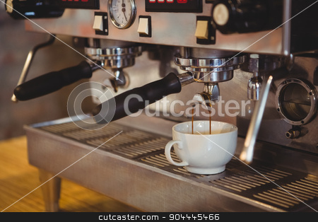 To use this stock image in your creative project, please select the size you need over to the right and click the "Add to Cart" button.
Your downloaded image will come with the Cutcaster watermark removed so don’t worry about the watermark you see on this page. Machine making a cup of coffee stock photo, Machine making a cup of coffee in a cafe by Wavebreak Media