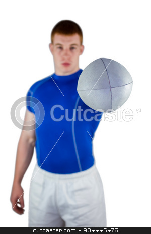 To use this stock image in your creative project, please select the size you need over to the right and click the "Add to Cart" button.
Your downloaded image will come with the Cutcaster watermark removed so don’t worry about the watermark you see on this page. Rugby player handing a rugby ball stock photo, Portrait of a rugby player handing rugby ball on a white background by Wavebreak Media
