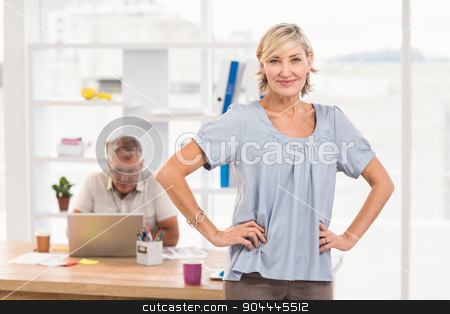To use this stock image in your creative project, please select the size you need over to the right and click the "Add to Cart" button.
Your downloaded image will come with the Cutcaster watermark removed so don’t worry about the watermark you see on this page. Smiling businesswoman with hands on hips stock photo, Portrait of a smiling businesswoman with hands on hips at office by Wavebreak Media