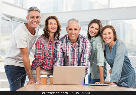 To use this stock image in your creative project, please select the size you need over to the right and click the "Add to Cart" button.
Your downloaded image will come with the Cutcaster watermark removed so don’t worry about the watermark you see on this page. Five casual colleagues using laptop stock photo, Five casual colleagues using laptop in the office by Wavebreak Media