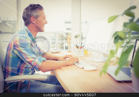 To use this stock image in your creative project, please select the size you need over to the right and click the "Add to Cart" button.
Your downloaded image will come with the Cutcaster watermark removed so don’t worry about the watermark you see on this page. Smiling casual designer using computer stock photo, Smiling casual designer using computer in the office by Wavebreak Media