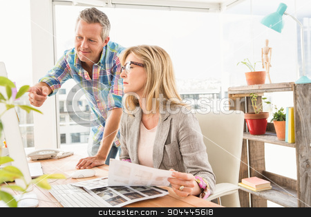 To use this stock image in your creative project, please select the size you need over to the right and click the "Add to Cart" button.
Your downloaded image will come with the Cutcaster watermark removed so don’t worry about the watermark you see on this page. Casual designer briefing his colleague stock photo, Casual designer briefing his colleague in the office by Wavebreak Media