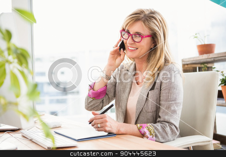 To use this stock image in your creative project, please select the size you need over to the right and click the "Add to Cart" button.
Your downloaded image will come with the Cutcaster watermark removed so don’t worry about the watermark you see on this page. Smiling casual designer having a phone call stock photo, Portrait of smiling casual designer having a phone call in the office by Wavebreak Media