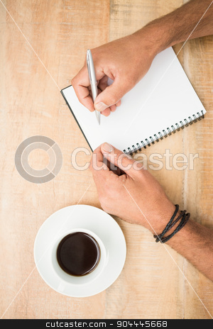 To use this stock image in your creative project, please select the size you need over to the right and click the "Add to Cart" button.
Your downloaded image will come with the Cutcaster watermark removed so don’t worry about the watermark you see on this page. Hands writing on notepad stock photo, Hands writing on notepad on wooden table by Wavebreak Media