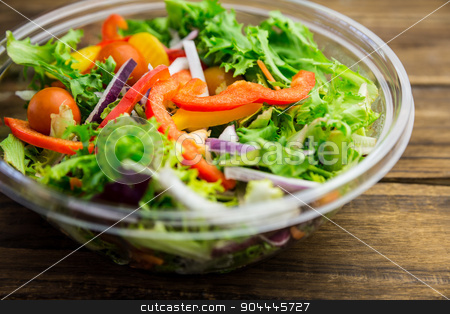 To use this stock image in your creative project, please select the size you need over to the right and click the "Add to Cart" button.
Your downloaded image will come with the Cutcaster watermark removed so don’t worry about the watermark you see on this page. Healthy bowl of salad on table stock photo, Healthy bowl of salad on table shot in studio by Wavebreak Media