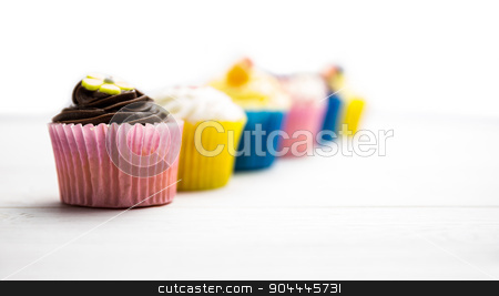 To use this stock image in your creative project, please select the size you need over to the right and click the "Add to Cart" button.
Your downloaded image will come with the Cutcaster watermark removed so don’t worry about the watermark you see on this page. Delicious cupcakes on a table stock photo, Delicious cupcakes on a table shot in studio by Wavebreak Media
