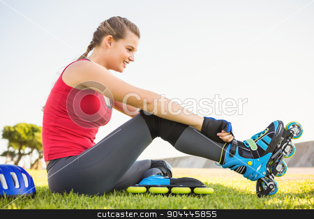 To use this stock image in your creative project, please select the size you need over to the right and click the "Add to Cart" button.
Your downloaded image will come with the Cutcaster watermark removed so don’t worry about the watermark you see on this page. Smiling sporty blonde skater sitting in grass stock photo, Smiling sporty blonde skater sitting in grass at promenade by Wavebreak Media