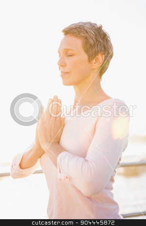 To use this stock image in your creative project, please select the size you need over to the right and click the "Add to Cart" button.
Your downloaded image will come with the Cutcaster watermark removed so don’t worry about the watermark you see on this page. Peaceful sporty woman meditating at promenade stock photo, Peaceful sporty woman meditating at promenade on a sunny day by Wavebreak Media