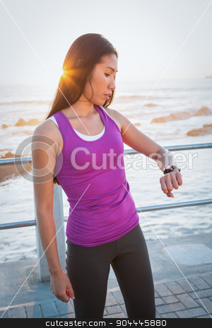 To use this stock image in your creative project, please select the size you need over to the right and click the "Add to Cart" button.
Your downloaded image will come with the Cutcaster watermark removed so don’t worry about the watermark you see on this page. Fit woman checking smart watch at promenade stock photo, Fit woman checking smart watch at promenade on a sunny day by Wavebreak Media