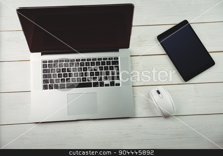 To use this stock image in your creative project, please select the size you need over to the right and click the "Add to Cart" button.
Your downloaded image will come with the Cutcaster watermark removed so don’t worry about the watermark you see on this page. Overhead view of a desk stock photo, Overhead view of a desk with electronic devices by Wavebreak Media