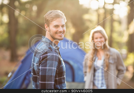 To use this stock image in your creative project, please select the size you need over to the right and click the "Add to Cart" button.
Your downloaded image will come with the Cutcaster watermark removed so don’t worry about the watermark you see on this page. Happy young camper couple smiling stock photo, Happy young camper couple smiling at the camera in the nature by Wavebreak Media