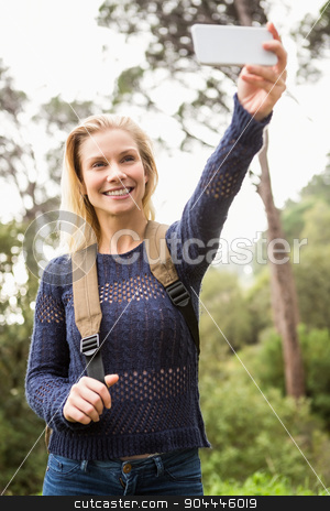 To use this stock image in your creative project, please select the size you need over to the right and click the "Add to Cart" button.
Your downloaded image will come with the Cutcaster watermark removed so don’t worry about the watermark you see on this page. Smiling female hiker taking a selfie stock photo, Smiling female hiker taking a selfie with smartphone by Wavebreak Media